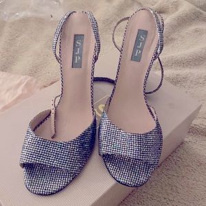 SJP by Sarah Jessica Parker
Silver Wedge Heels Scintillate Disco Glitter Wedges